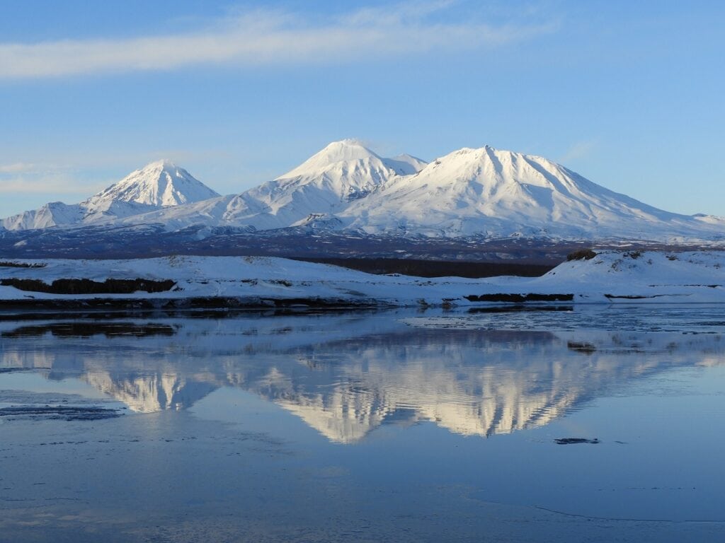 Exploring Volcanic Landscapes Through Impressionist Artistry